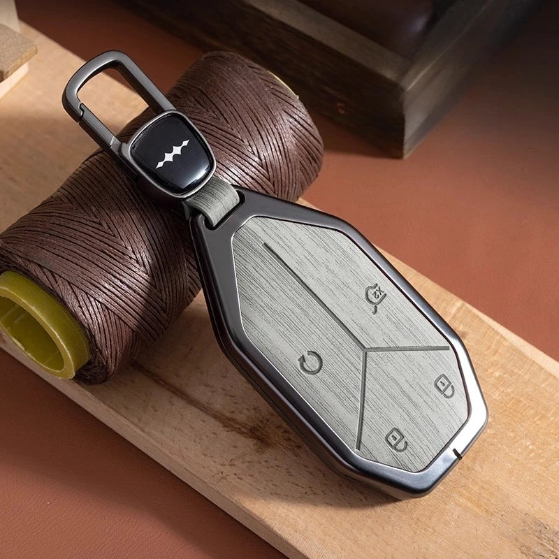 BYD Leopard 5 / 8 / Ti3 / Ti7 — Wood Grain Zinc Alloy Key Fob Case & Keychain (2025–2026)